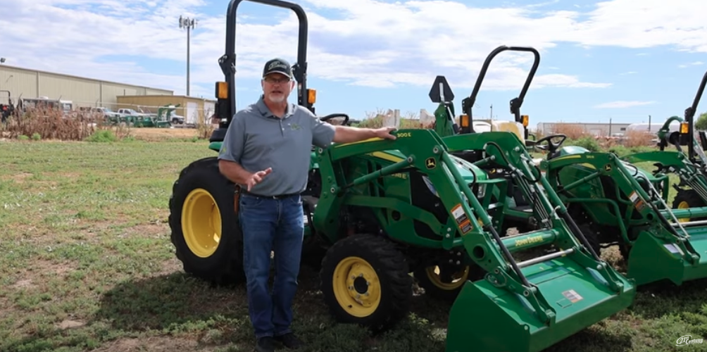 Neil Motley with the 3038E John Deere tractor